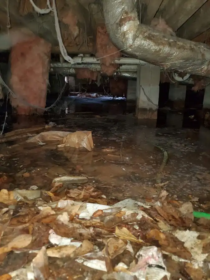 Crawl space flood assessment for Commercial Water Damage Restoration in Asbury